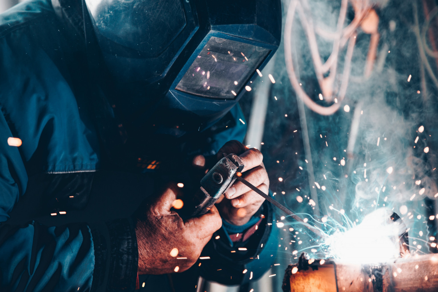 A welder in a potentially dangerous environment